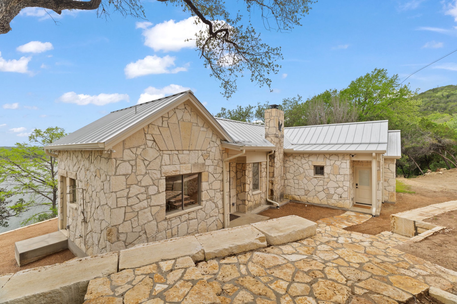 Original stone cabin exterior carried into the completed retreat